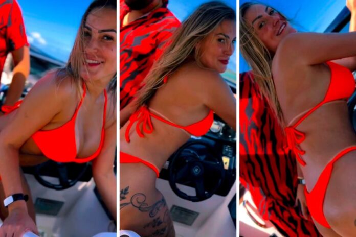 Andressa Urach rebola de biquíni, em lancha